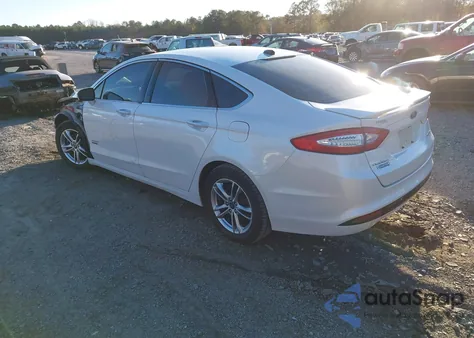 2016 Ford Fusion Energi Titanium from USA, damaged, VIN 3FA6P0SU3GR311816